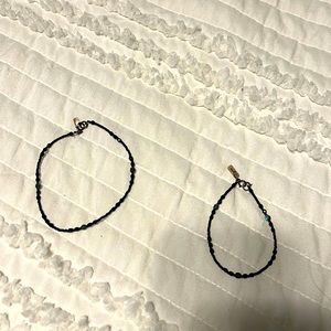 Holly Yashi, black beaded, anklet and bracelet.